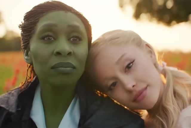 <p>Universal Pictures/Youtube</p> Ariana Grande and Cynthia Erivo appear in 'Wicked.'