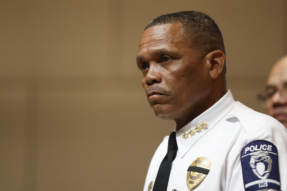 Charlotte-Mecklenburg Police Chief Johnny Jennings listens to a question during a press conference in Charlotte, N.C., Tuesday, April 30, 2024, regarding a shooting that killed four officers during an attempt to serve a warrant on April 29. (AP Photo/Nell Redmond)