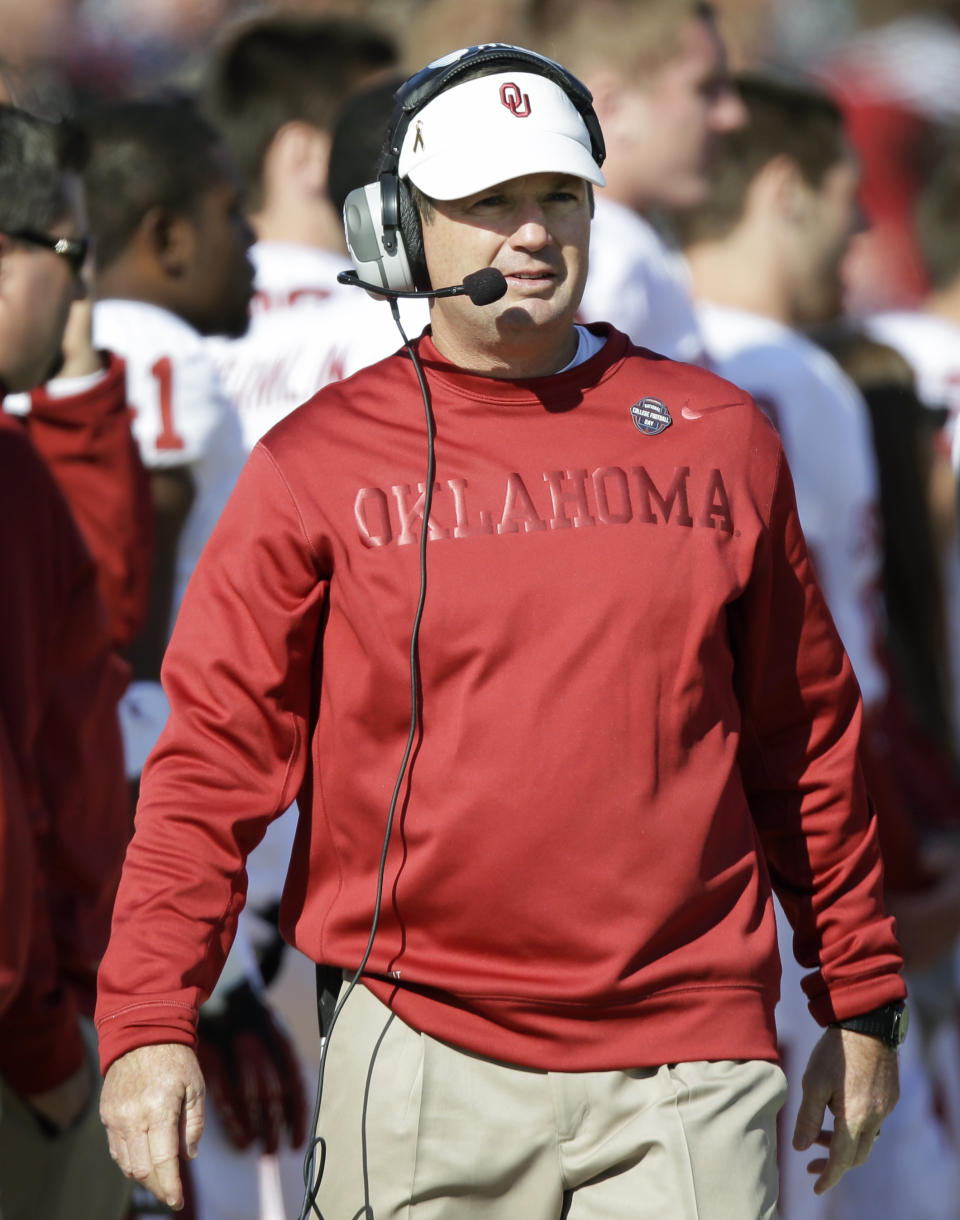 Oklahoma head coach Bob Stoops looks on during the second half of an NCAA college football game against Iowa State, Saturday, Nov. 3, 2012, in Ames, Iowa. Oklahoma won 35-20. (AP Photo/Charlie Neibergall)