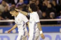 Football Soccer- Spanish La Liga Santander - Deportivo v Real Madrid - Riazor stadium, A Coruna, Spain - 26/04/17 Real Madrid's Lucas Vazquez (L) celebrates a goal with team mate Marcelo. REUTERS/Miguel Vidal