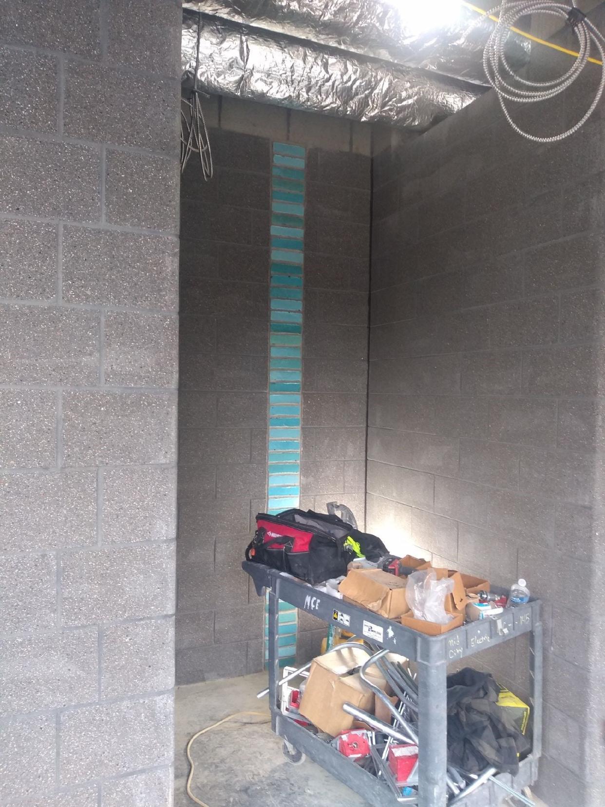 Once identified with the Macy's department store at Kingsdale Shopping Center, multicolored blue bricks, shown here on Wednesday, April 10, 2024, were salvaged and are now part of the locker room entrances at the $85-million Bob Crane Community Center under construction in Upper Arlington.