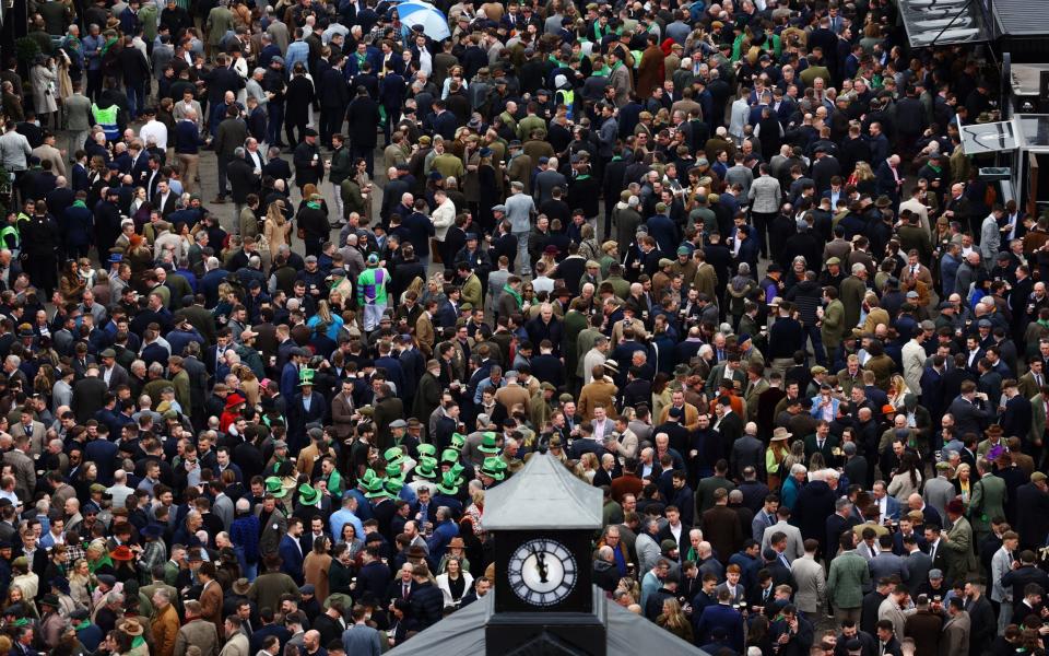 General view of racegoers in the Cheltenham Festivalâ€™s Guinness Village