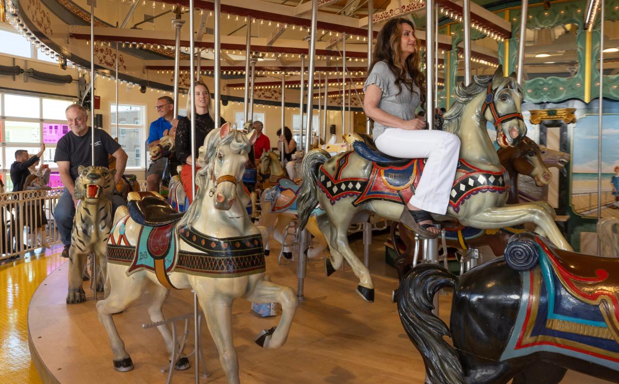 Guests enjoy first ride on the Seaside Heights carousel in its new building at the north end of the Seaside Heights boardwalk. The carousel, which is known as the Dr. Floyd L. Moreland Carousel, will be open for rides by the public starting July 3, 2024.