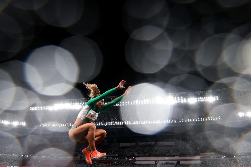 Portuguese athlete Claudia Santos competes in the Long Jump at the Tokyo Paralympics.