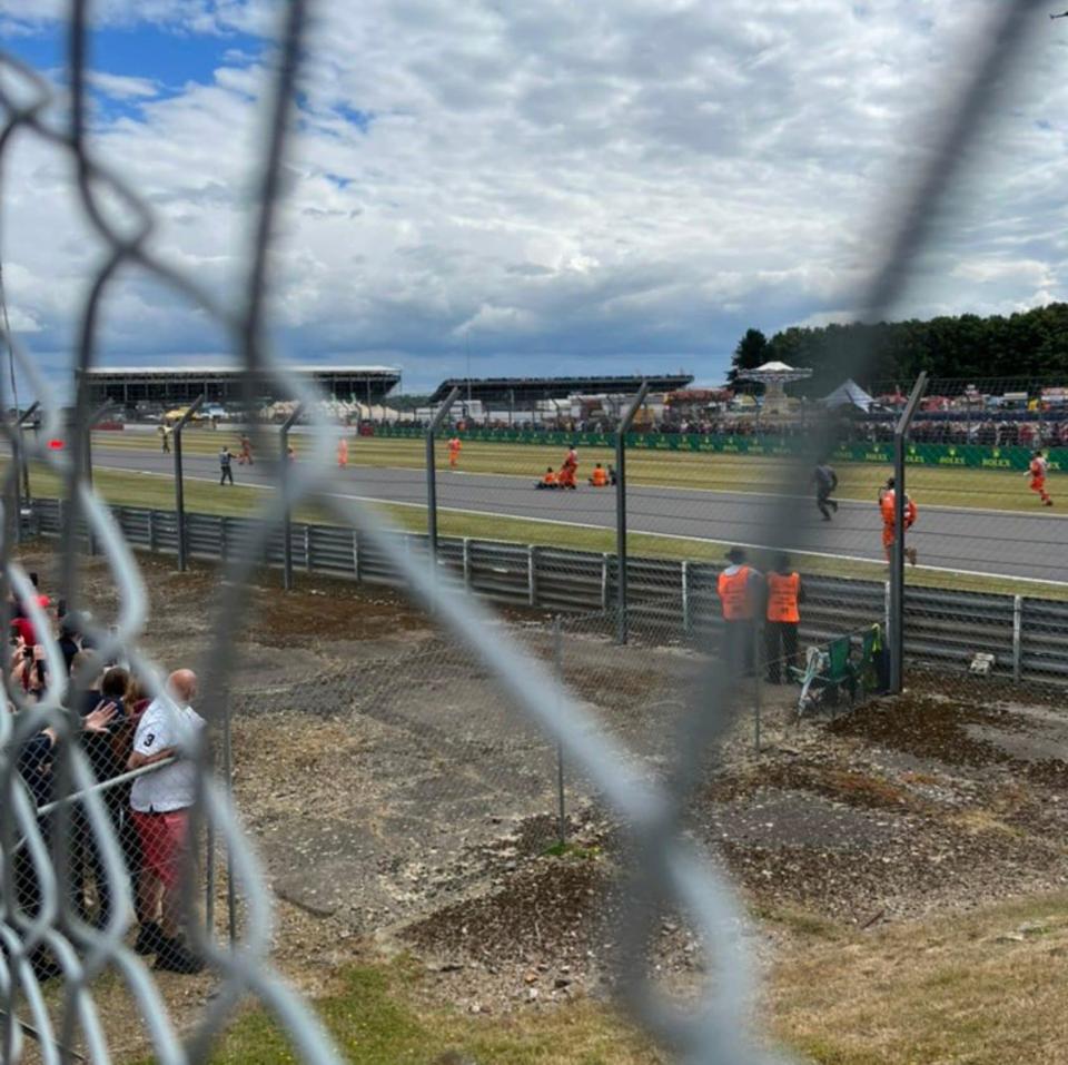 Protesters stormed the fence on the opening lap - @_HelenaHicks