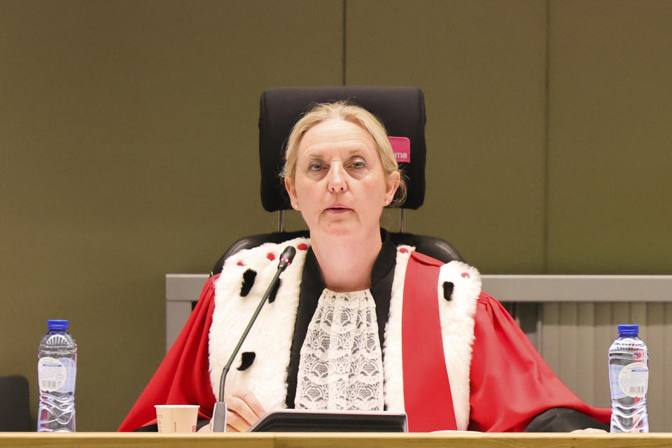 Judge Laurence Massart chairs the start of the Brussels terrorist attack trial verdict in the Justitia building in Brussels, Tuesday, July 25, 2023. A jury is expected to render its verdict Tuesday over Belgium's deadliest peacetime attack. The suicide bombings at the Brussels airport and a busy subway station in 2016 killed 32 people in a wave of attacks in Europe claimed by the Islamic State group. (Olivier Matthys, Pool Photo via AP)