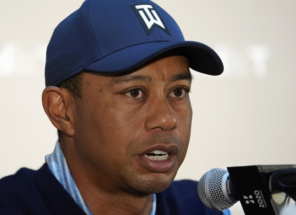 Tiger Woods of the United States answers a reporter's question during a news conference ahead of the Challenge: Japan Skins event at Accordia Golf Narashino C.C. in Inzai, Japan, Monday, Oct. 21, 2019. Tiger Woods will play at the Zozo Championship PGA Tour which will be held at Oct. 24-27. (AP Photo/Lee Jin-man)