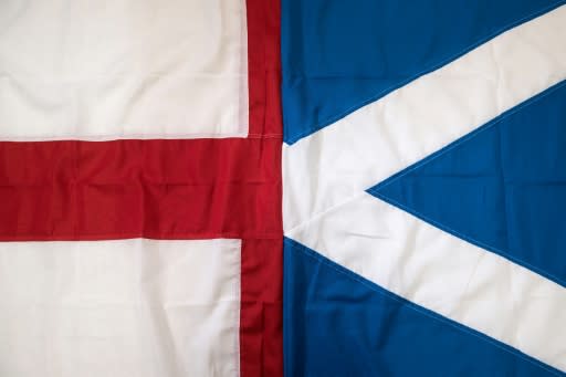 England's St George's Cross flag (left) and Scotland's Saltire