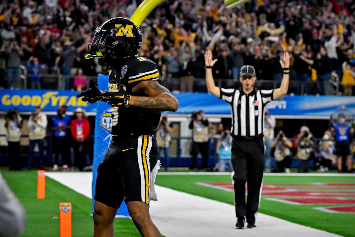 Dec 29, 2023; Arlington, TX, USA; Missouri Tigers wide receiver Luther Burden III (3) celebrates after he catches a pass for a touchdown against the Ohio State Buckeyes during the fourth quarter at AT&T Stadium. Mandatory Credit: Jerome Miron-USA TODAY Sports