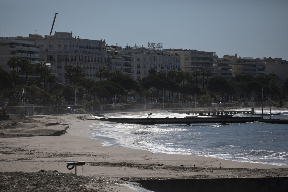 The deserted Croisette beach is pictured empty due to measures put in place to stop the spread of the coronavirus in Cannes, southern France, Tuesday, May 12, 2020. The Cannes Film Festival won't kick off as planned on Tuesday. The festival's 73rd edition has been postponed indefinitely, part of the worldwide shutdowns meant to stop the spread of the coronavirus. (AP Photo/Daniel Cole)