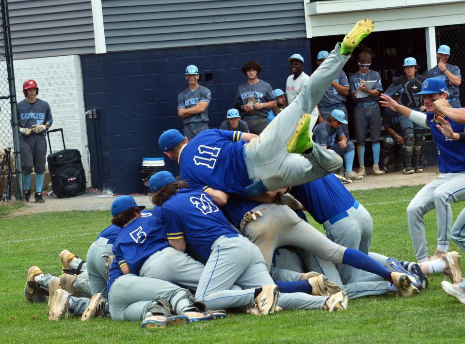 Clear Spring's Hutson Trobaugh (11) jumps on top of the pile in celebration of the Blazers' 3-0 victory over Catoctin in the Maryland Class 1A West Region II championship game Tuesday.
