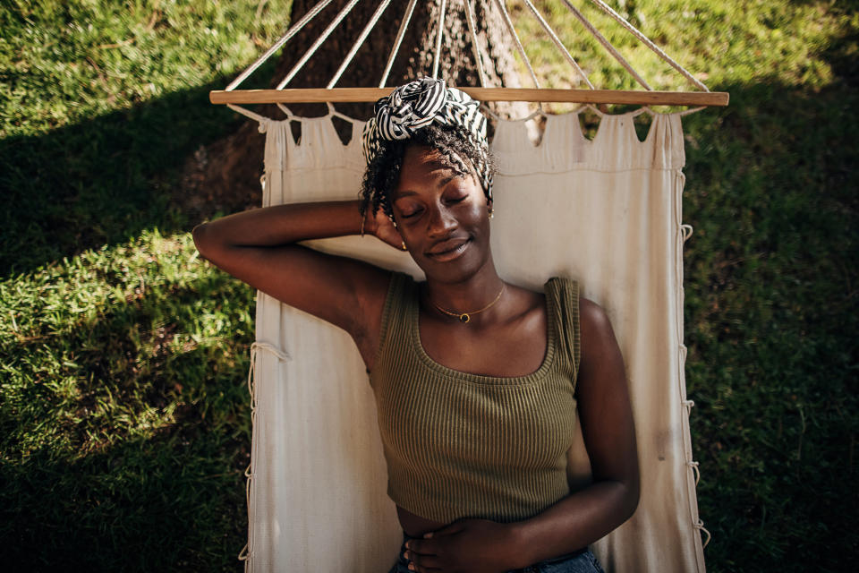 Woman napping outside. (Getty Images)