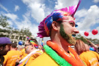 <p>Thousands of people take part in the annual Belfast Pride event in Belfast city center celebrating Northern Ireland’s LGBT community on Aug. 5, 2017. (Photo: Press Eye Ltd/REX/Shutterstock) </p>