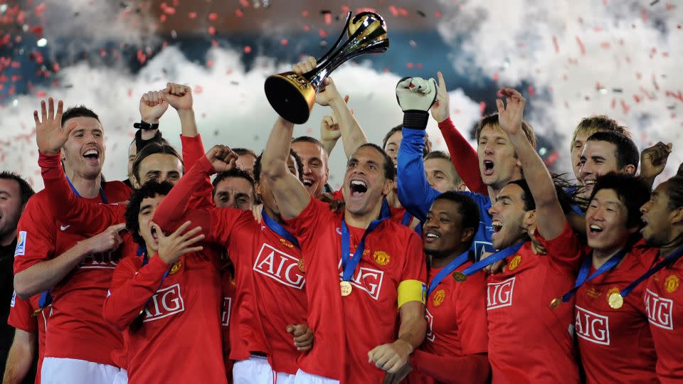 Rio Ferdinand lifts the FIFA Club World Cup Trophy in 2008. - Shaun Botterill/Getty Images