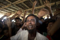 A Rohingya refugee cries as he shouts slogan during a protest against the repatriation process at Unchiprang refugee camp near Cox's Bazar, in Bangladesh, Thursday, Nov. 15, 2018. The head of Bangladesh's refugee commission said plans to begin a voluntary repatriation of Rohingya Muslim refugees to their native Myanmar on Thursday were scrapped after officials were unable to find anyone who wanted to return. (AP Photo/Dar Yasin)