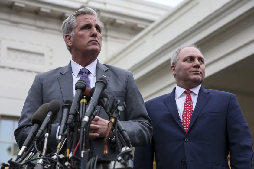 Rep. Kevin McCarthy, joined by Rep. Steve Scalise, talks to reporters outside of the West Wing of the White House on Jan. 2.