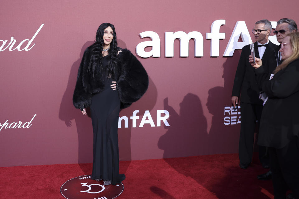 Cher poses for photographers upon arrival at the amfAR Cinema Against AIDS benefit at the Hotel du Cap-Eden-Roc, during the 77th Cannes international film festival, Cap d'Antibes, southern France, Thursday, May 23, 2024. (Photo by Vianney Le Caer/Invision/AP)