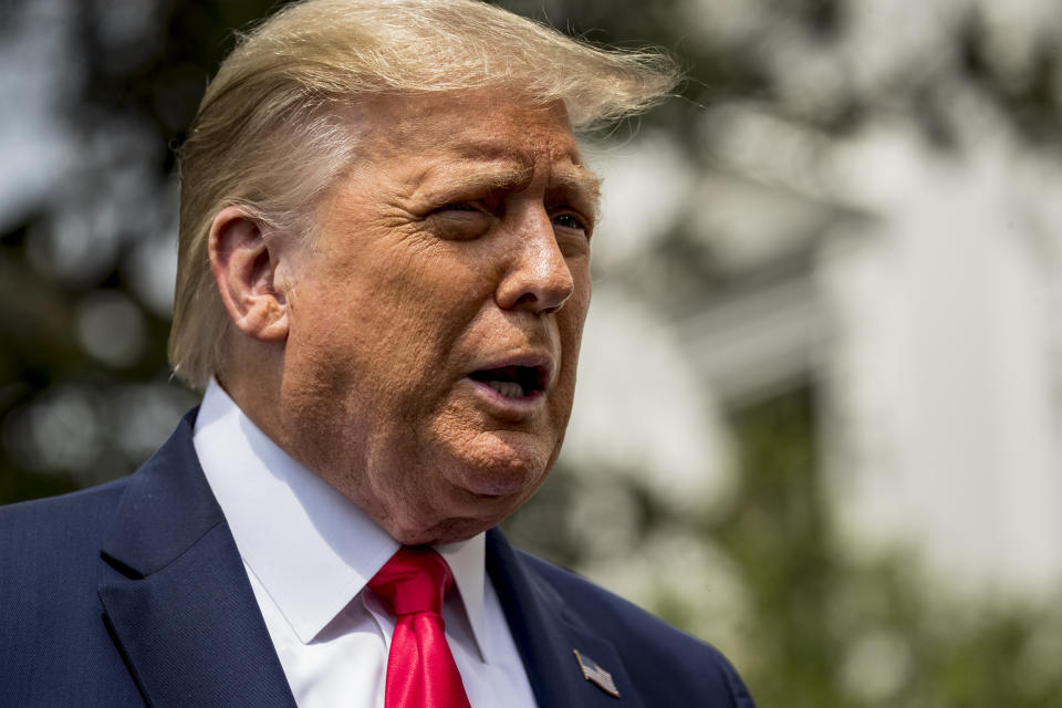 President Donald Trump speaks with members of the media before boarding Marine One on the South Lawn of the White House in Washington, Thursday, Aug. 6, 2020, for a short trip to Andrews Air Force Base, Md. and then on to Cleveland, Ohio. (AP Photo/Andrew Harnik)