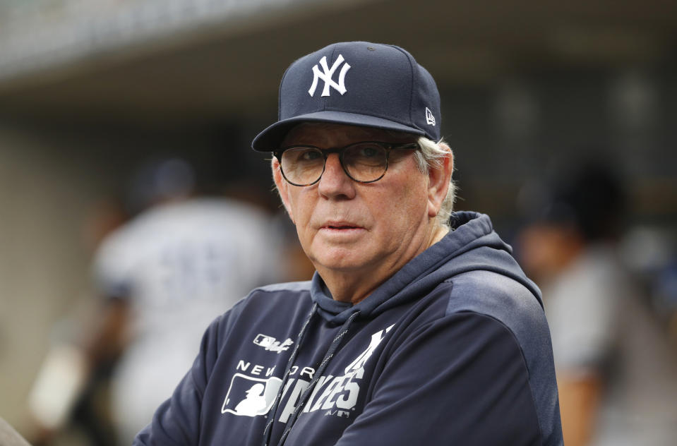 FILE - In this Sept. 10, 2019, file photo, New York Yankees pitching coach Larry Rothschild watches during the first inning of the team's baseball game against the Detroit Tigers in Detroit. Rothschild has been hired in the same position by the San Diego Padres. Rothschild is one of several newcomers on rookie manager Jayce Tingler’s staff announced Thursday, Dec. 5. Rothschild spent the last nine seasons with the Yankees before being fired after last season. He replaces Darren Balsley. (AP Photo/Paul Sancya, File)