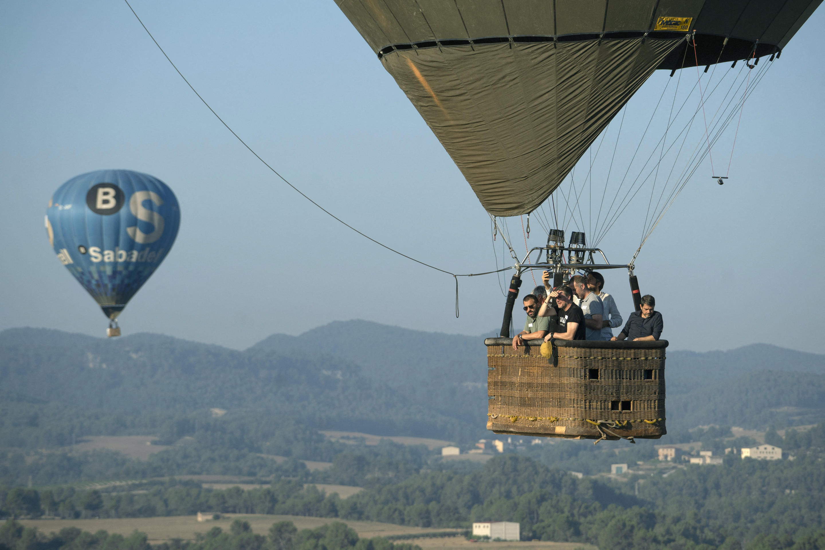 Hot-air balloons fly in the European Balloon Festival on July 11. 