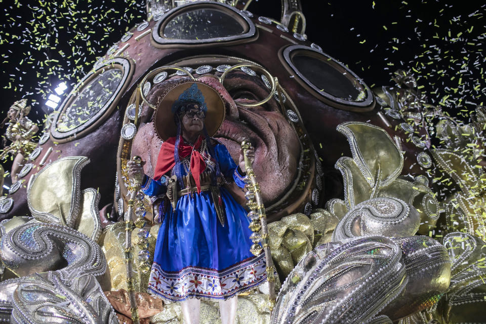 A performer from the Imperatriz Leopoldinense samba school parades on a float during Carnival celebrations at the Sambadrome in Rio de Janeiro, Brazil, Tuesday, Feb. 21, 2023. (AP Photo/Bruna Prado)