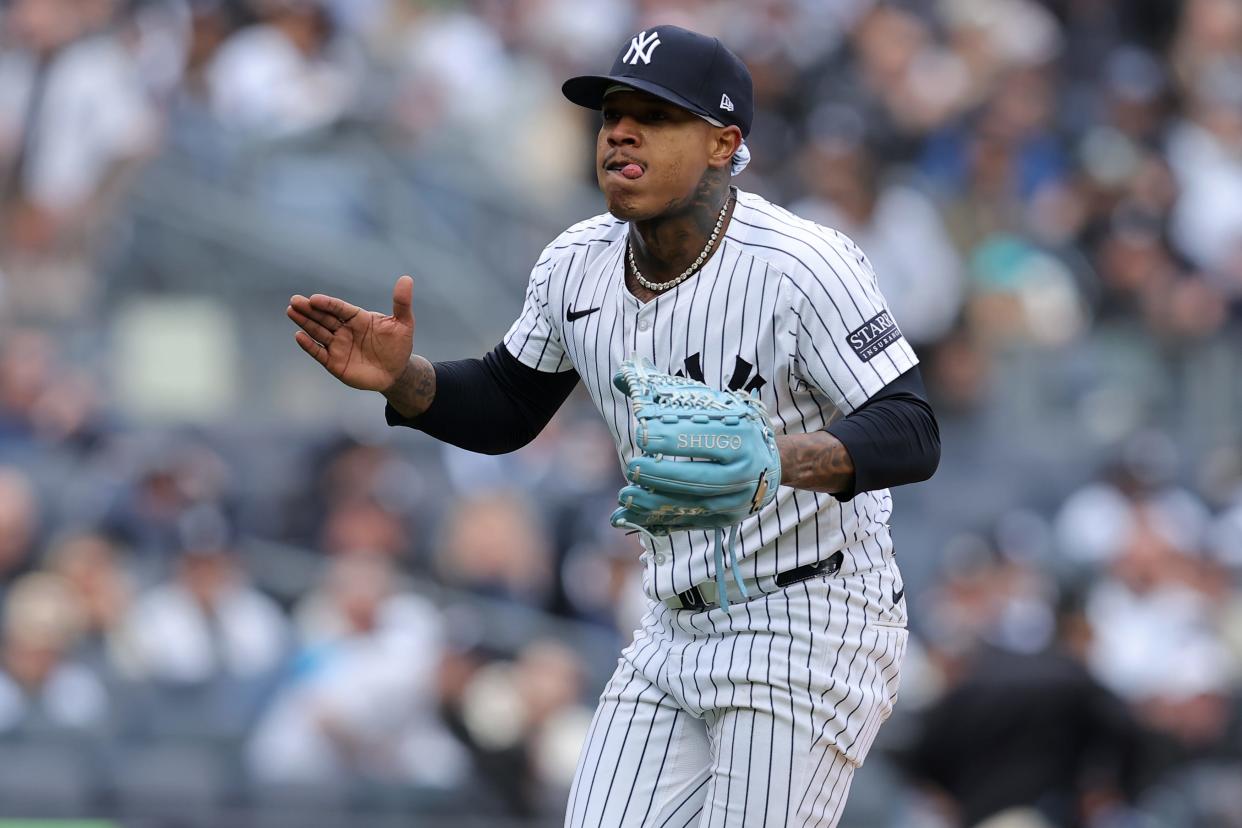 Apr 5, 2024; Bronx, New York, USA; New York Yankees starting pitcher Marcus Stroman (0) claps after striking out Toronto Blue Jays first baseman Vladimir Guerrero Jr. (not pictured) during the fifth inning at Yankee Stadium. Mandatory Credit: Brad Penner-USA TODAY Sports