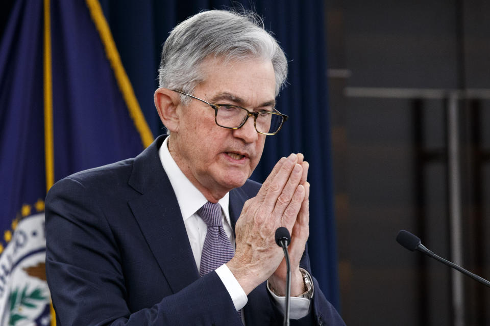 Federal Reserve Chair Jerome Powell gestures while speaking during a news conference after the Federal Open Market Committee meeting, Wednesday, Dec. 11, 2019, in Washington. The Federal Reserve is leaving its benchmark interest rate alone and signaling that it expects to keep low rates unchanged through next year. (AP Photo/Jacquelyn Martin)