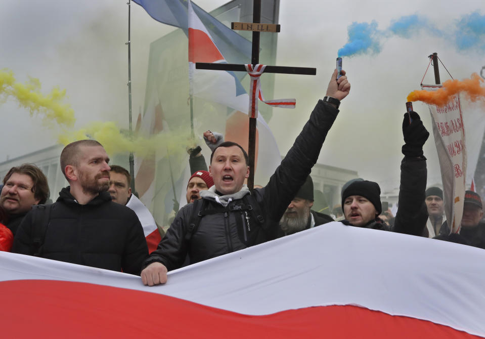 Protesters attend a rally in downtown Minsk, Belarus, Saturday, Dec. 7, 2019. More than 1,000 opposition demonstrators are rallying in Belarus to protest closer integration with Russia. Saturday's protest in the Belarusian capital comes as Belarusian President Alexander Lukashenko is holding talks with Russian President Vladimir Putin in Sochi on Russia's Black Sea coast. (AP Photo/Sergei Grits)