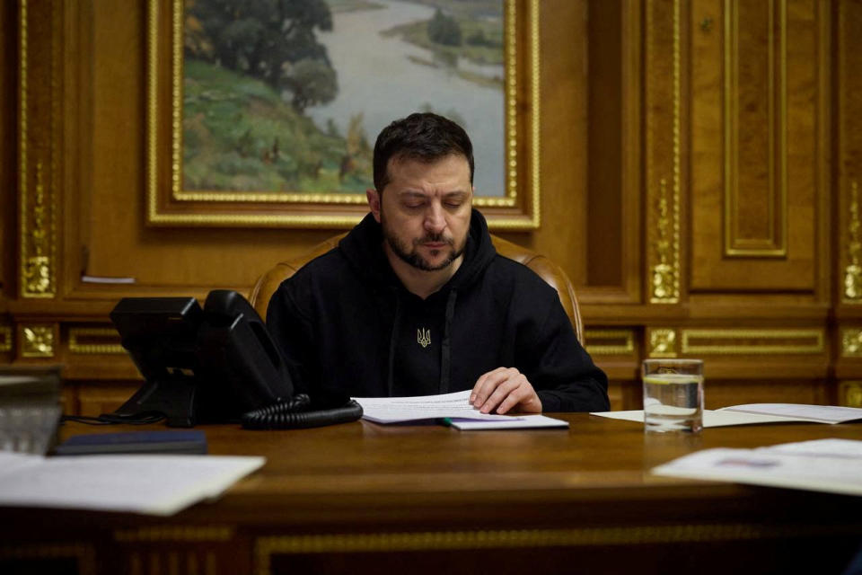 Ukraine's President Volodymyr Zelensky speaks with German Chancellor Olaf Scholz (not pictured) via phone line, amid Russia's attack on Ukraine, in Kyiv, Ukraine January 25, 2023. Ukrainian Presidential Press Service/Handout via REUTERS ATTENTION EDITORS - THIS IMAGE HAS BEEN SUPPLIED BY A THIRD PARTY.