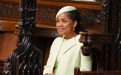 Doria Ragland, mother of the bride, wells up inside St George's Chapel - Credit: Dominic Lipinksi/PA