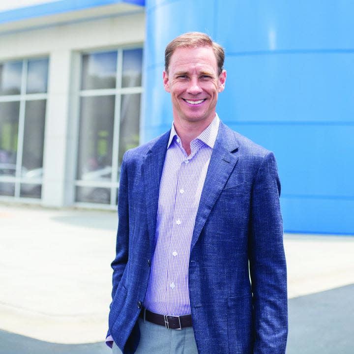 Michael Anderson outside of the Fred Anderson Honda dealership in Greenville. Anderson Automotive Group purchased dealerships in Greenville and Greenville from the Bradshaw family in January.