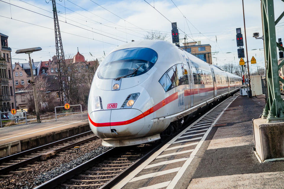 Fuerth / Germany - March 11, 2018: ICE 3, intercity-Express train from Deutsche Bahn passes train station fuerth in germany.