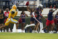 Jackson State wide receiver Shane Hooks (5) sprints past a Southern University defender with a 40-yard touchdown pass reception during the first half of the Southwestern Athletic Conference championship NCAA college football game Saturday, Dec. 3, 2022, in Jackson, Miss. (AP Photo/Rogelio V. Solis)