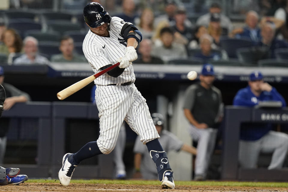 New York Yankees' Kyle Higashioka hits a two-run double during the fifth inning of a baseball game against the Texas Rangers Wednesday, Sept. 22, 2021, in New York. (AP Photo/Frank Franklin II)