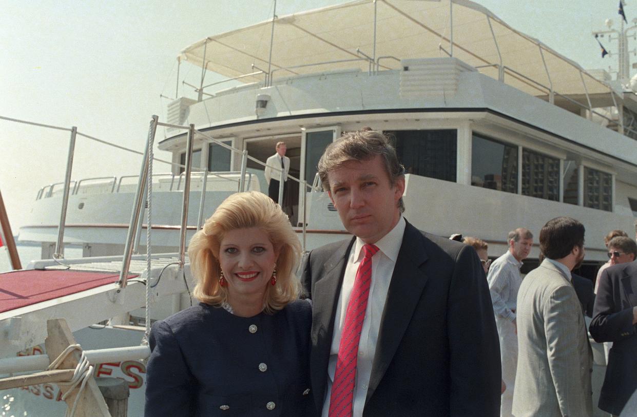 Donald Trump and his wife, Ivana, pose with their new luxury yacht The Trump Princess docked at the 30th Street pier on the East River in New York on Monday, July 4, 1988.