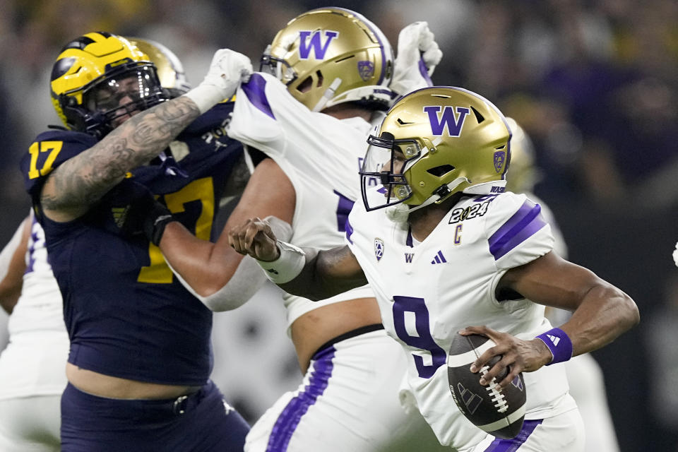Washington quarterback Michael Penix Jr. looks to pass against Michigan during the first half of the national championship NCAA College Football Playoff game Monday, Jan. 8, 2024, in Houston. (AP Photo/Eric Gay)