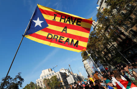 People gather near the old university of Barcelona, two days after the banned independence referendum in Barcelona, Spain October 3, 2017. REUTERS/Yves Herman