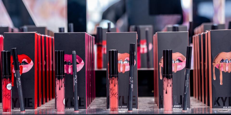 Boxes of Kylie Cosmetics products on display.