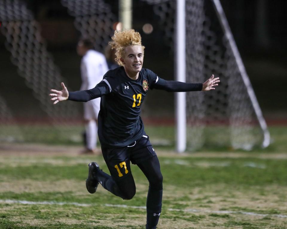 Ryland Risk of Palm Desert celebrates a goal he helped set up during the CIF-SS playoff quarterfinal against Coachella Valley in Palm Desert, Calif., Feb. 15, 2023. 