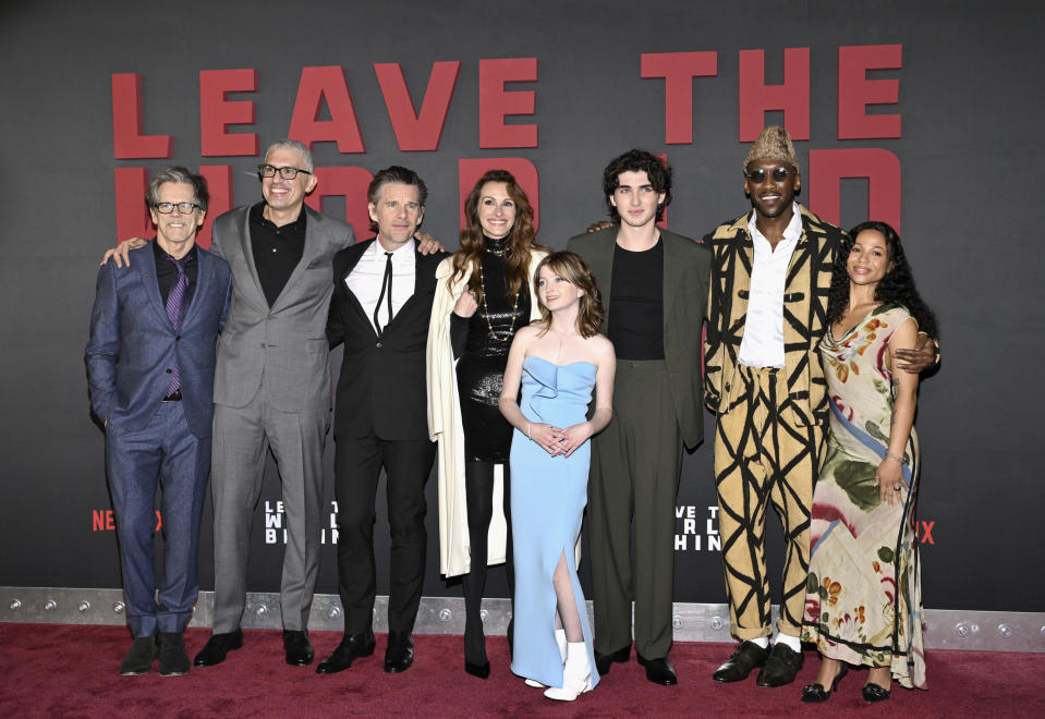 From left, Kevin Bacon, Sam Esmail, Ethan Hawke, Julia Roberts, Farrah Mackenzie, Charlie Evans, Mahershala Ali and Myha'la Herrold pose together at the premiere of Netflix's "Leave the World Behind" at the Plaza Hotel on Monday, Dec. 4, 2023, in New York. (Photo by Evan Agostini/Invision/AP)