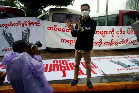 Reporters protest as they call on Myanmar government and military authorities to release reporters who were arrested in Yangon, Myanmar June 30, 2017. REUTERS/Soe Zeya Tun