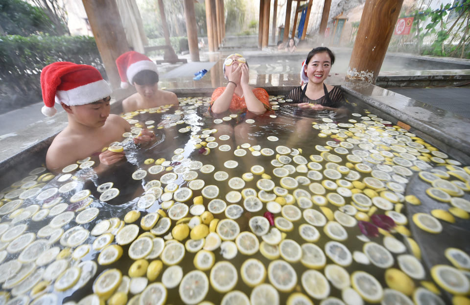 People bath at a hot spring center in Luoyang, China