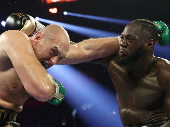 Deontay Wilder punches Tyson Fury (Getty)