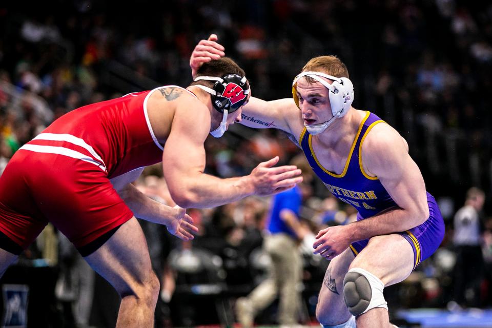 Northern Iowa's Parker Keckeisen, right, wrestles Wisconsin's Christopher Weiler at 184 pounds during the first session of the NCAA Division I Wrestling Championships, Thursday, March 17, 2022, at Little Caesars Arena in Detroit, Mich.