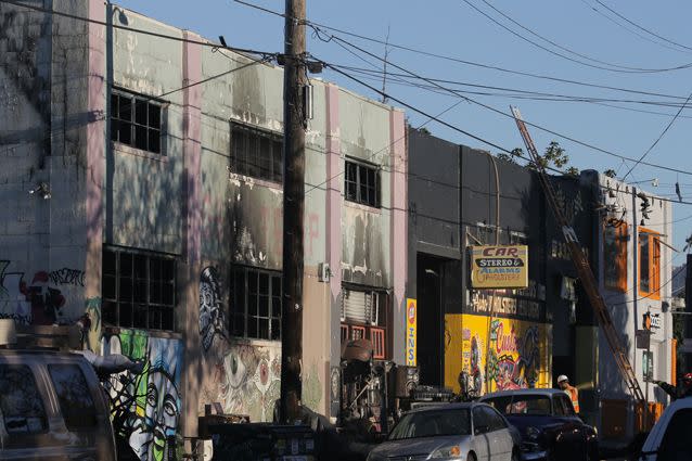 The face of a building in the daylight following the fire, which killed at least 24 people. Photo: Getty Images