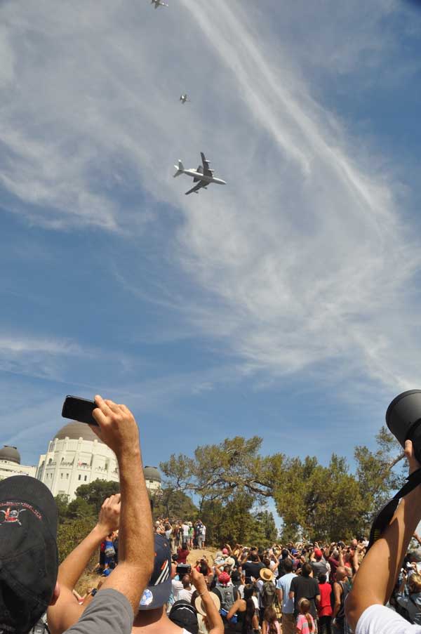 The Endeavour passes over the Griffith Observatory in Los Angeles. Courtesy of Wayne Chan.