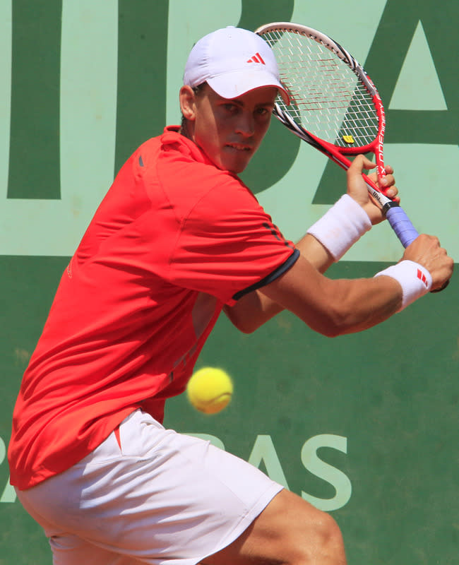 Canada's Vasek Pospisil hits a return to France's Edouard Roger-Vasselin during their Men's Singles 1st Round tennis match of the French Open tennis tournament at the Roland Garros stadium, on May 27, 2012 in Paris. AFP PHOTO / JACQUES DEMARTHONJACQUES DEMARTHON/AFP/GettyImages