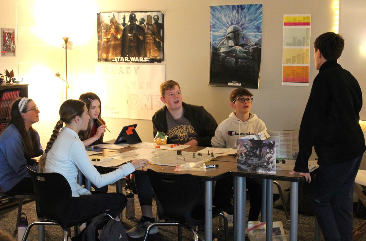 Students play Dungeons & Dragons in Kade Wells' classroom at Harrisburg East Middle School on Friday, March 22, 2024.