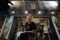 In this Oct. 9, 2020 photo, owner Grace Ma poses for a photo at her bar Club 71 in Central, a business district of Hong Kong. Nearly 15 years ago, the bar known as a gathering place for pro-democracy activists and intellectuals is closing. Ma blames government-mandated bar closures and coronavirus restrictions for its financial strain. (AP Photo/Kin Cheung)