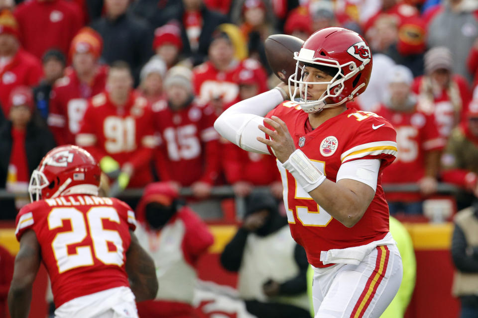 Kansas City Chiefs quarterback Patrick Mahomes (15) throws a pass during the first half of an NFL football game against the Oakland Raiders in Kansas City, Mo., Sunday, Dec. 30, 2018. (AP Photo/Charlie Riedel)